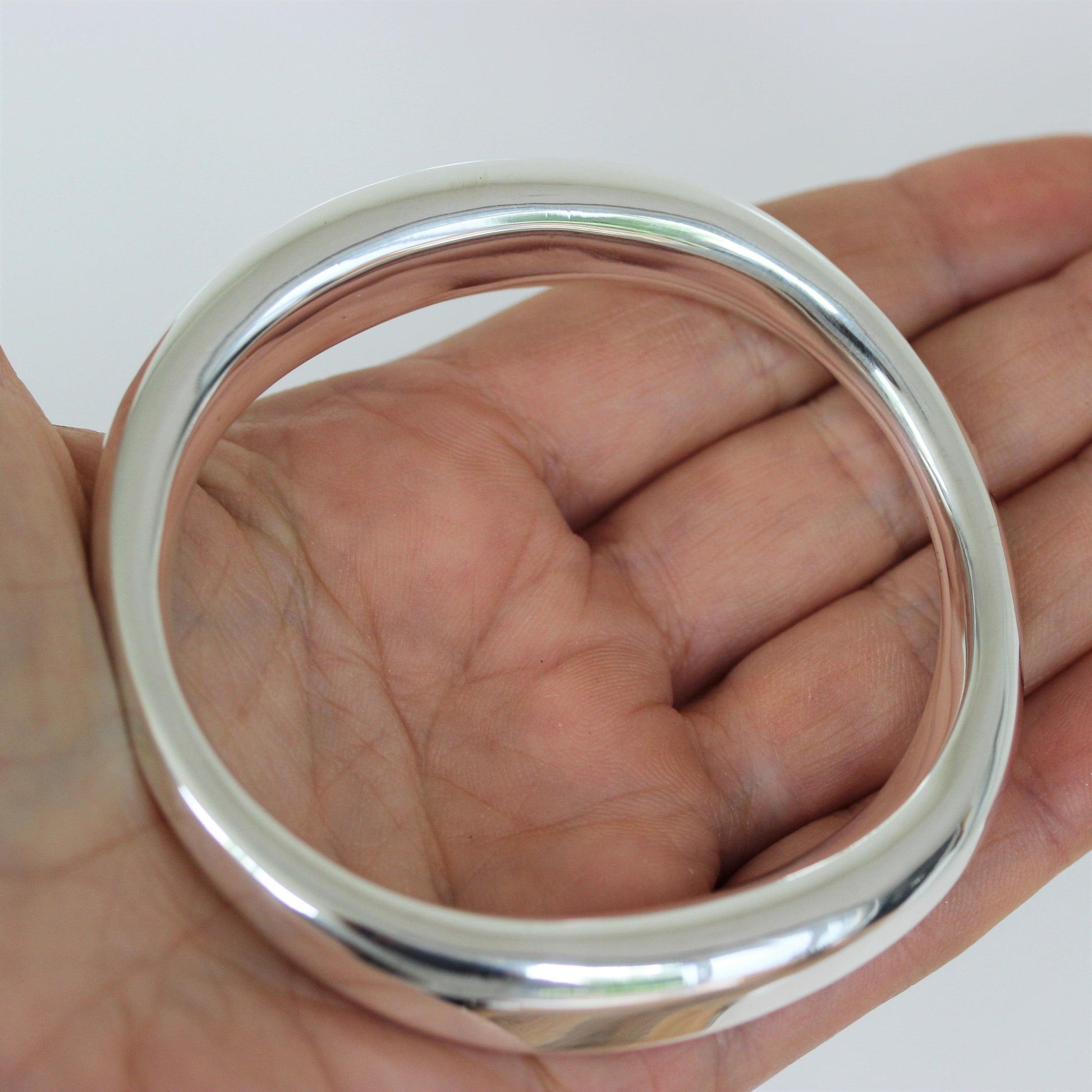 Sterling Silver 64mm Diameter Asymmetrical Oval Bangle - STERLING SILVER DESIGNS